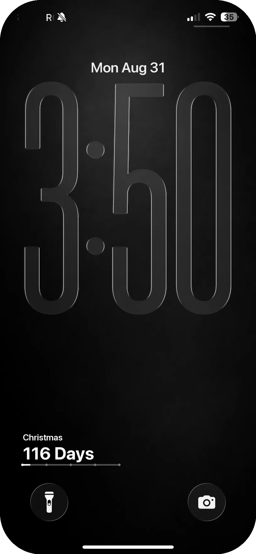 Real iPhone Lock Screen showing a DayDrop Christmas countdown widget reading 116 days below the clock